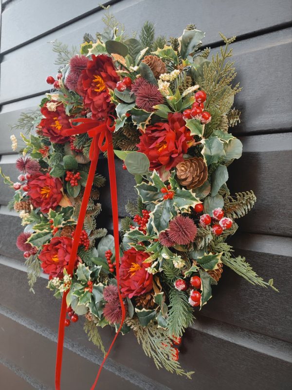 Traditional style faux Christmas wreath with red ranunculus flowers - Image 2