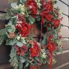 Traditional style faux Christmas wreath with red ranunculus flowers - Image 3